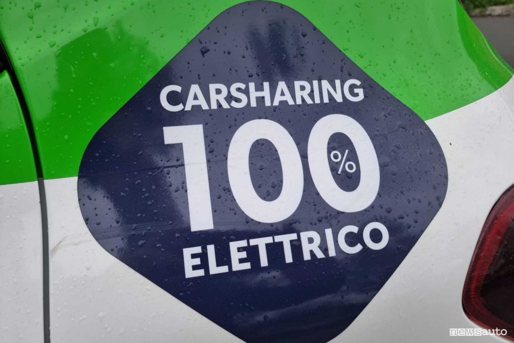 Dacia Spring logo car-sharing 100% elettrico