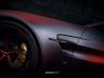 Aston Martin Vantage S dettagli pinze freno in movimento